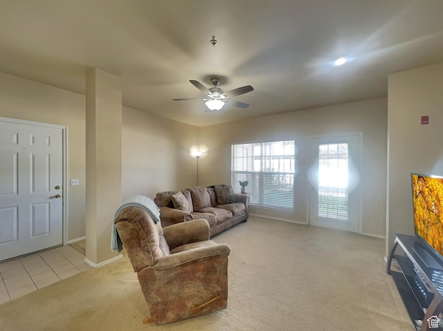 900 Bitner Rd Unit M12, Park City, UT 84098 - living room featuring light carpet, baseboards, a ceiling fan, and light tile patterned floors