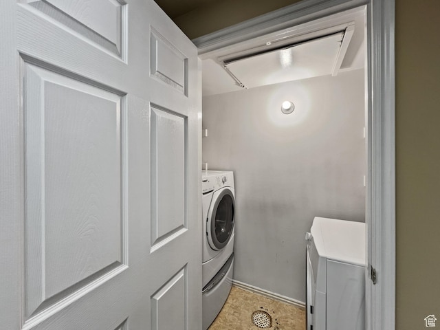 900 Bitner Rd Unit M12, Park City, UT 84098 - washroom featuring washing machine and clothes dryer and baseboards