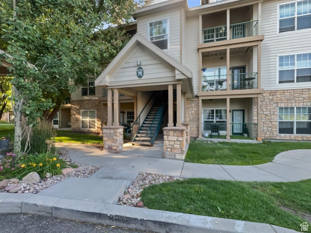 900 Bitner Rd Unit M12, Park City, UT 84098 - view of front of house featuring stairs and stone siding