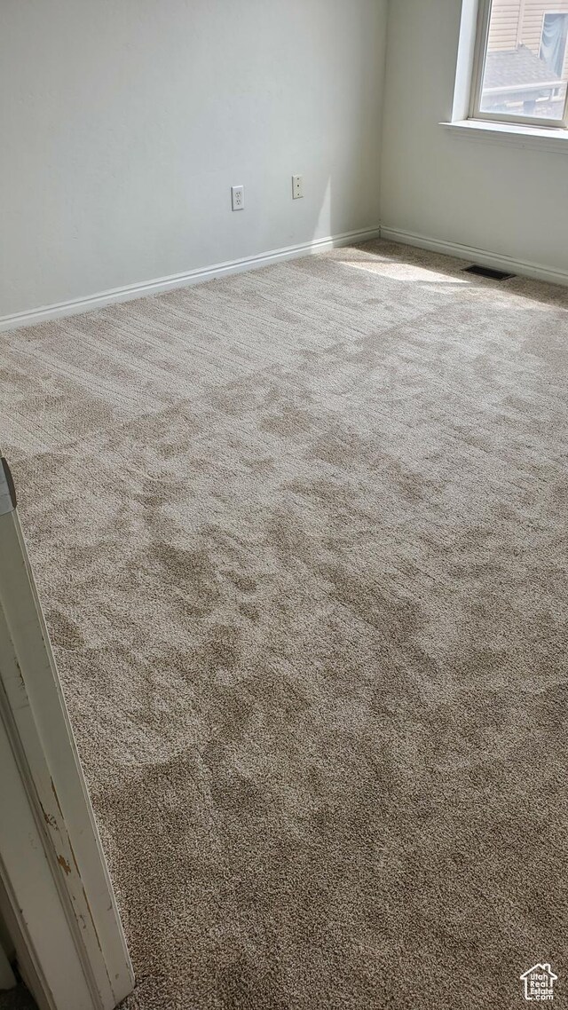 1596 W 300 S Unit 14, Vernal, UT 84078 - carpeted empty room with baseboards and visible vents