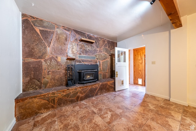 89 W 100 S, Kanab, UT 84741 - unfurnished living room with tile walls, tile patterned floors, and a wood stove