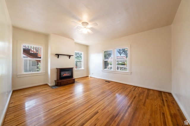 89 W 100 S, Kanab, UT 84741 - unfurnished living room featuring light hardwood / wood-style flooring and ceiling fan