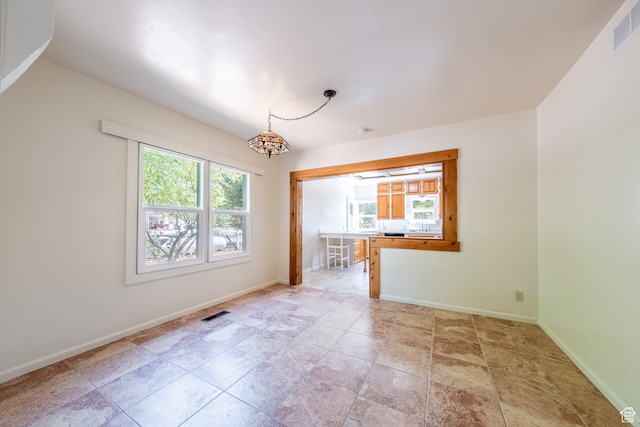 89 W 100 S, Kanab, UT 84741 - tiled empty room featuring a wealth of natural light