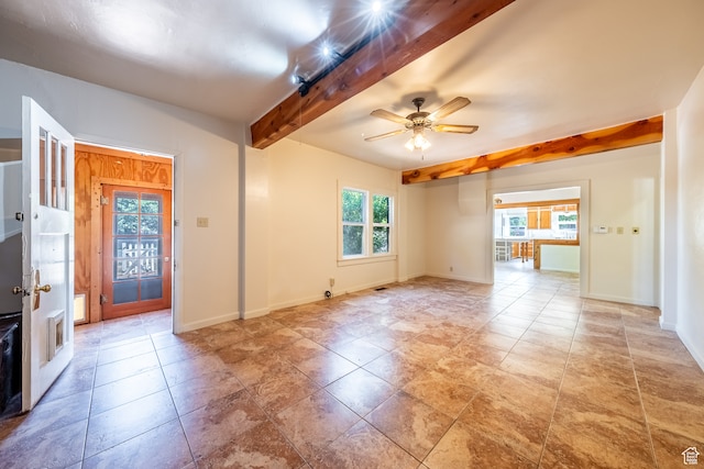 89 W 100 S, Kanab, UT 84741 - unfurnished living room featuring beamed ceiling, light tile patterned floors, and ceiling fan