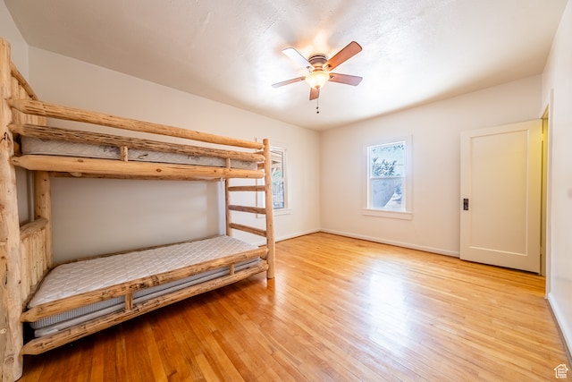 89 W 100 S, Kanab, UT 84741 - unfurnished bedroom with light hardwood / wood-style flooring and ceiling fan