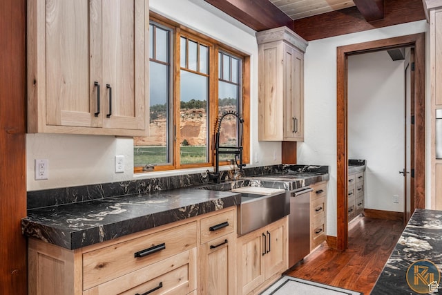 5605 N Johnson Canyon Rd, Kanab, UT 84741 - kitchen featuring dark countertops, dark wood-style flooring, light brown cabinets, a sink, and plenty of natural light