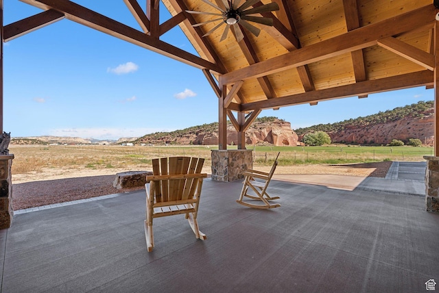 5605 N Johnson Canyon Rd, Kanab, UT 84741 - view of patio featuring a mountain view and ceiling fan