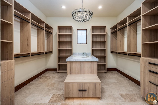 5605 N Johnson Canyon Rd, Kanab, UT 84741 - walk in closet featuring a chandelier