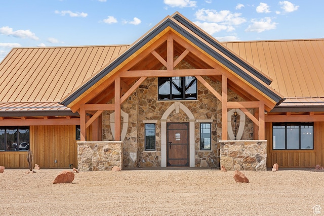 5605 N Johnson Canyon Rd, Kanab, UT 84741 - view of front of property with a standing seam roof, stone siding, and metal roof