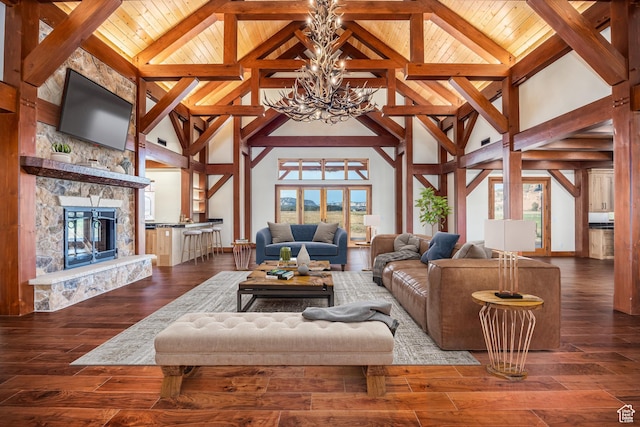 5605 N Johnson Canyon Rd, Kanab, UT 84741 - living room with a chandelier, high vaulted ceiling, plenty of natural light, hardwood / wood-style floors, and wood ceiling with exposed beams