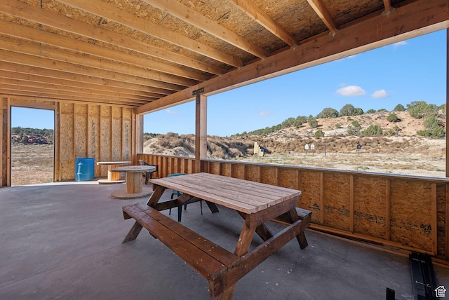 5605 N Johnson Canyon Rd, Kanab, UT 84741 - view of patio / terrace with outdoor dining area and a mountain view