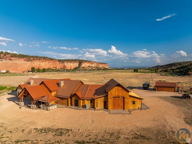 5605 N Johnson Canyon Rd, Kanab, UT 84741 - view of front of property featuring metal roof, a view of rural / pastoral area, and a standing seam roof