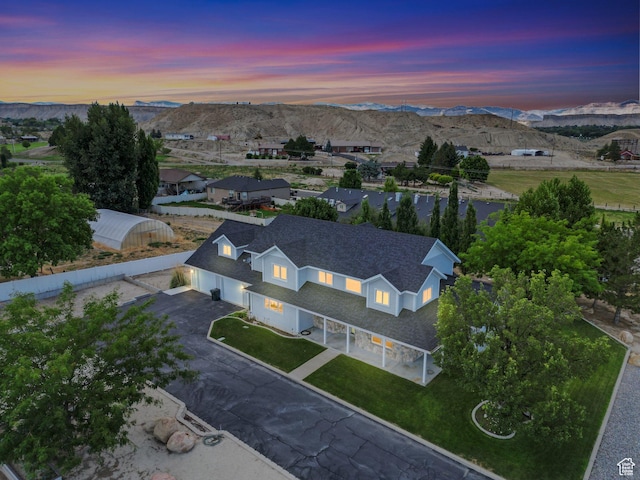 401 N Fairgrounds Rd, Price, UT 84501 - aerial view at dusk with a mountain view