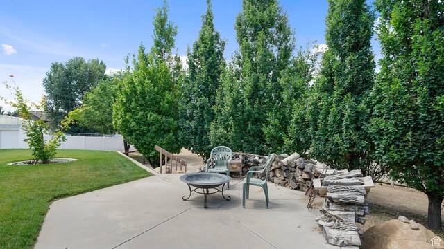 401 N Fairgrounds Rd, Price, UT 84501 - view of patio with an outdoor fire pit