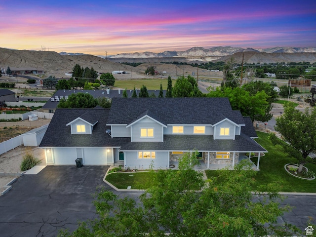 401 N Fairgrounds Rd, Price, UT 84501 - aerial view at dusk featuring a mountain view
