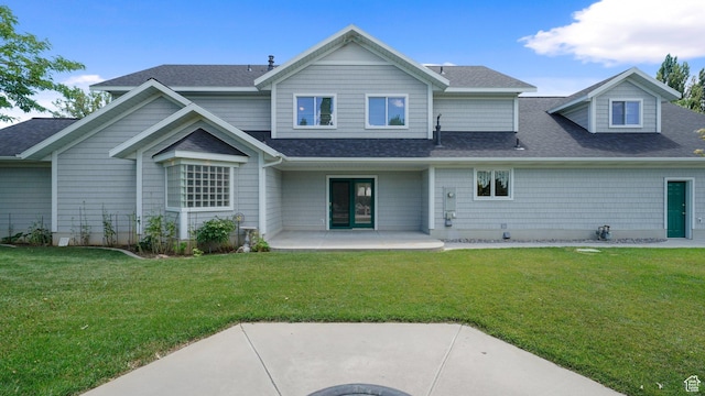 401 N Fairgrounds Rd, Price, UT 84501 - back of property featuring a patio area and a lawn