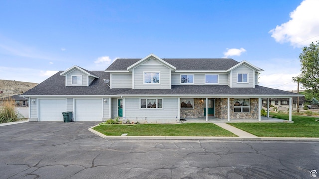 401 N Fairgrounds Rd, Price, UT 84501 - view of front of property with a garage and a front lawn