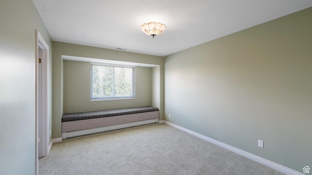 401 N Fairgrounds Rd, Price, UT 84501 - carpeted spare room featuring baseboard heating
