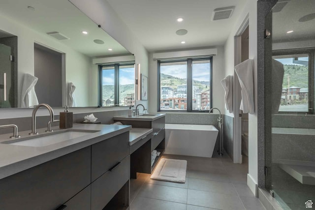 3599 Ridgeline Dr Unit 2, Park City, UT 84098 - bathroom featuring shower with separate bathtub, tile patterned flooring, and dual bowl vanity