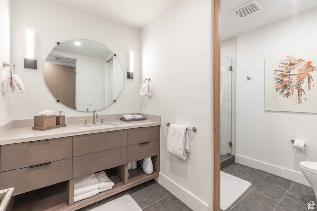 3599 Ridgeline Dr Unit 2, Park City, UT 84098 - bathroom with vanity, toilet, a shower with door, and tile patterned flooring