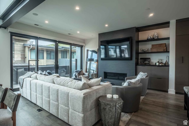3599 Ridgeline Dr Unit 2, Park City, UT 84098 - living room featuring a fireplace and dark hardwood / wood-style flooring