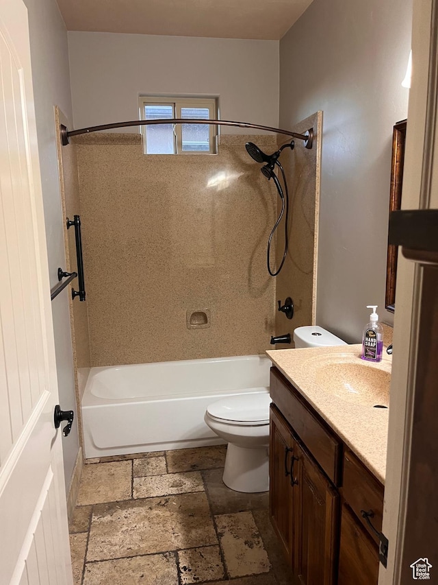 650 N Red Stone Rd Unit 22, Washington, UT 84780 - full bathroom with vanity,  shower combination, toilet, and stone tile flooring