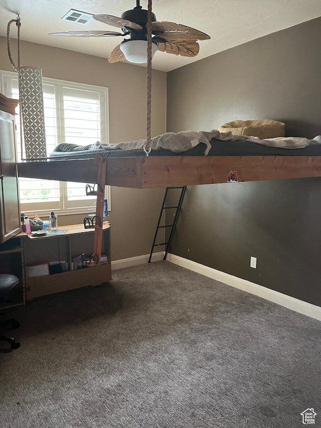650 N Red Stone Rd Unit 22, Washington, UT 84780 - bedroom featuring a ceiling fan, baseboards, visible vents, and carpet floors
