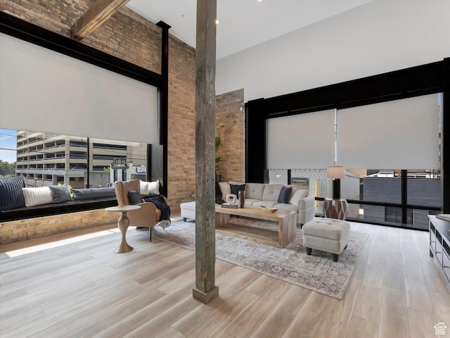 231 S Edison St E Unit 7, Salt Lake City, UT 84111 - living area featuring a high ceiling and wood finished floors