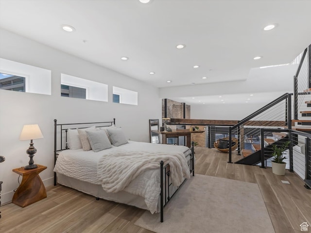 231 S Edison St E Unit 7, Salt Lake City, UT 84111 - bedroom with light wood-type flooring and recessed lighting