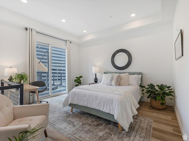 231 S Edison St E Unit 3, Salt Lake City, UT 84111 - bedroom with access to outside, light wood-style floors, and recessed lighting