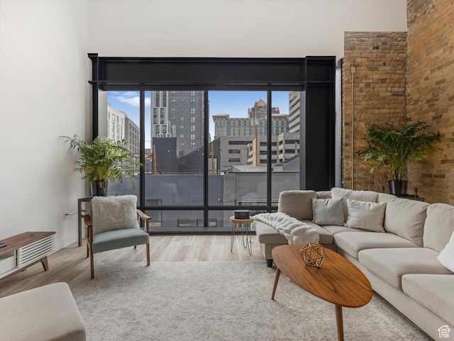 231 S Edison St E Unit 3, Salt Lake City, UT 84111 - living area with wood finished floors and a city view
