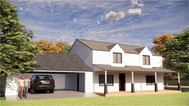 view of front of home featuring a front yard, an attached garage, and a porch