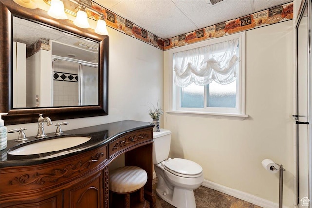 1154 W 1700 S, Syracuse, UT 84075 - bathroom featuring a shower with shower door, a textured ceiling, vanity, toilet, and baseboards