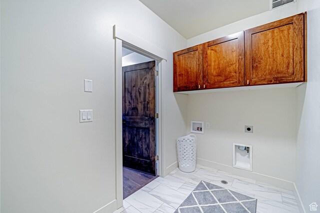 1120 N 520 W Unit 1, Midway, UT 84049 - washroom with cabinet space, baseboards, marble finish floor, washer hookup, and electric dryer hookup