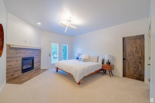 1120 N 520 W Unit 1, Midway, UT 84049 - bedroom with baseboards, a fireplace with flush hearth, carpet, access to outside, and recessed lighting