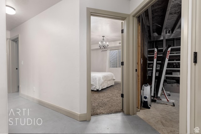 267 N 250 W, La Verkin, UT 84745 - hall with a notable chandelier, baseboards, and concrete flooring