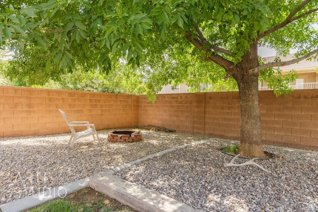 267 N 250 W, La Verkin, UT 84745 - view of yard with a fenced backyard and an outdoor fire pit
