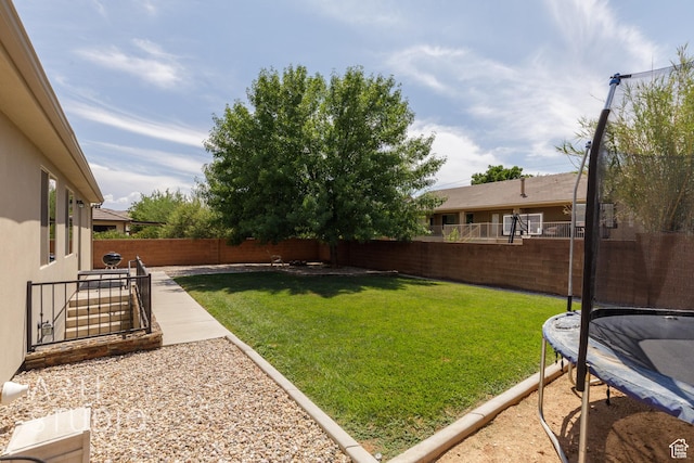 267 N 250 W, La Verkin, UT 84745 - view of yard with a patio area, a trampoline, and a fenced backyard