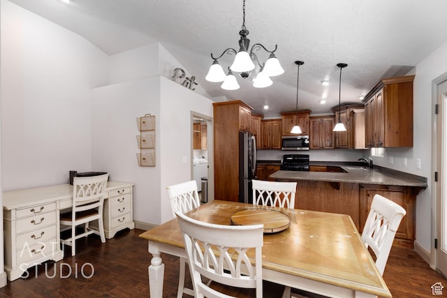 267 N 250 W, La Verkin, UT 84745 - dining space with washer / dryer, a textured ceiling, an inviting chandelier, and dark wood-style flooring