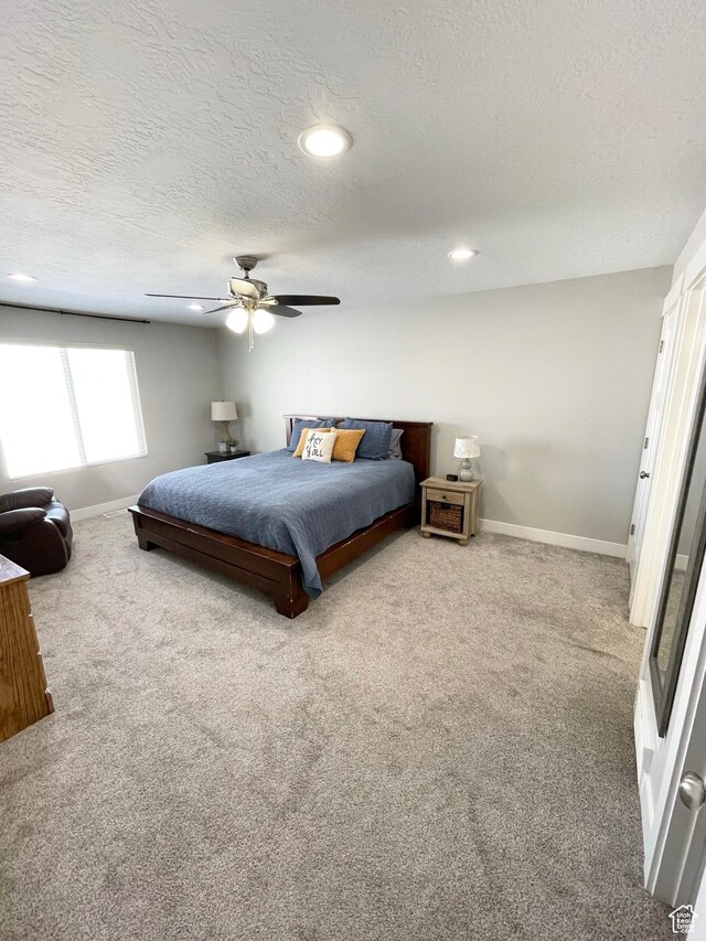 1999 E Abbey Way, Eagle Mountain, UT 84005 - carpeted bedroom with a ceiling fan, recessed lighting, a textured ceiling, and baseboards