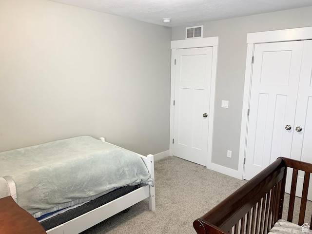 1999 E Abbey Way, Eagle Mountain, UT 84005 - bedroom with a closet, carpet, visible vents, and baseboards