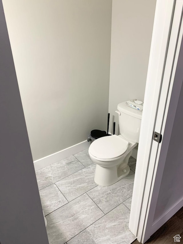 1999 E Abbey Way, Eagle Mountain, UT 84005 - bathroom with baseboards and toilet