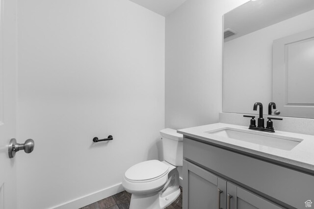 1791 N 180 E, Heber City, UT 84032 - bathroom featuring wood finished floors, vanity, toilet, and baseboards
