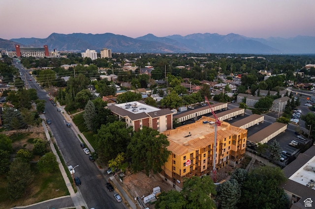 aerial view at dusk with a mountain view