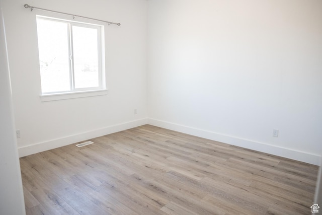 2159 W 520 S, Roosevelt, UT 84066 - empty room featuring wood finished floors and baseboards