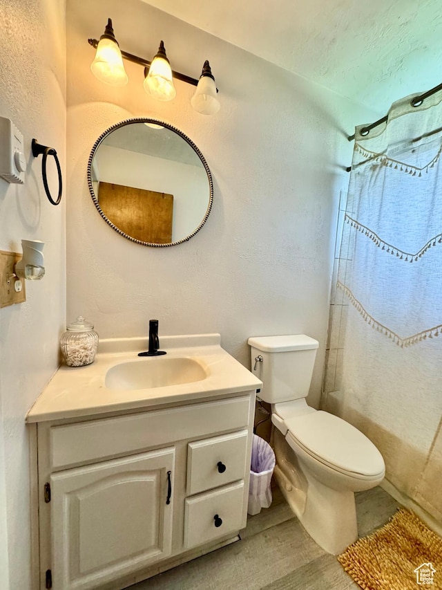 805 E 2910 S, Vernal, UT 84078 - full bath featuring toilet, curtained shower, a textured wall, and vanity
