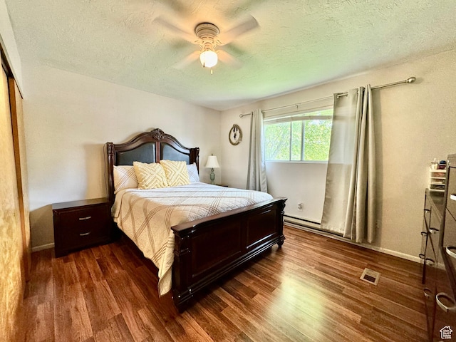 805 E 2910 S, Vernal, UT 84078 - bedroom with a ceiling fan, visible vents, a textured ceiling, and wood finished floors