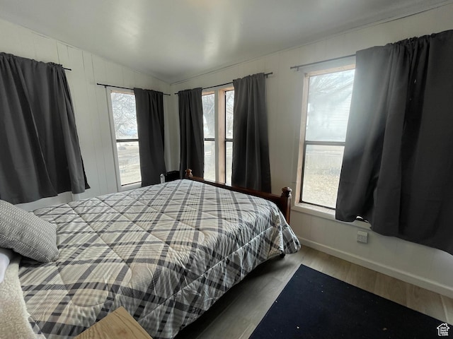 431 Circle Way, Sunnyside, UT 84539 - bedroom featuring hardwood / wood-style flooring and lofted ceiling