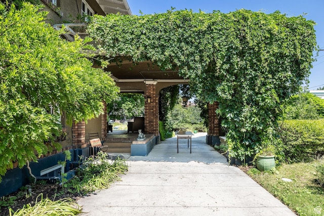 view of property's community with a patio