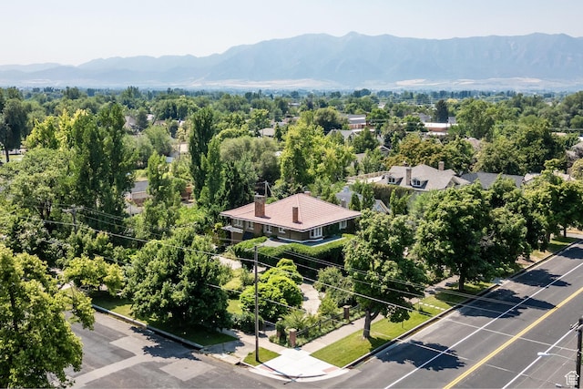 birds eye view of property featuring a mountain view